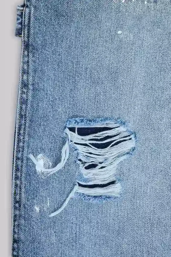 Blå vintage-slitna snickarjeans
