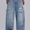 Blå vintage-slitna snickarjeans
