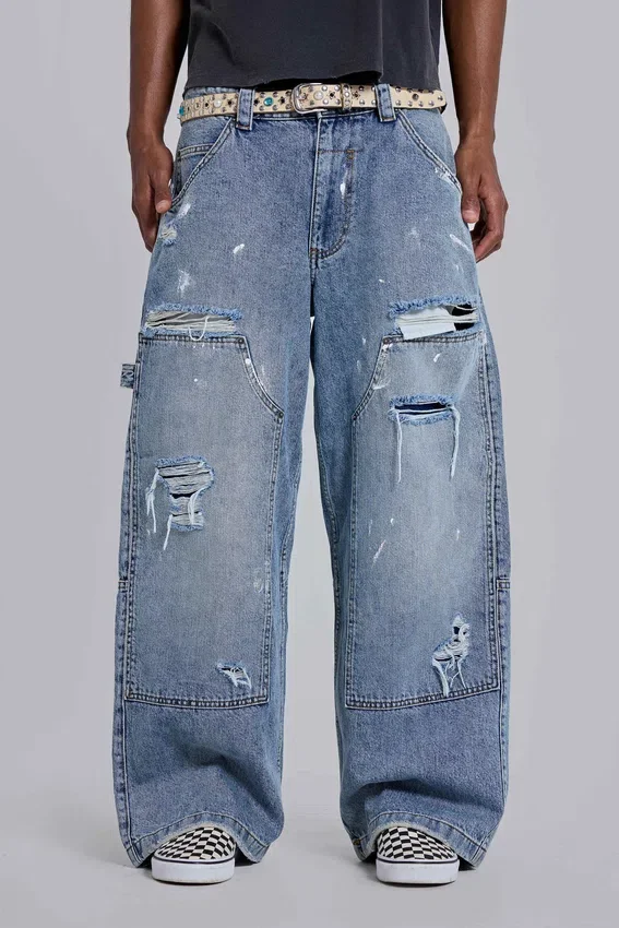 Blå vintage-slitna snickarjeans