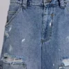 Blå vintage-slitna snickarjeans