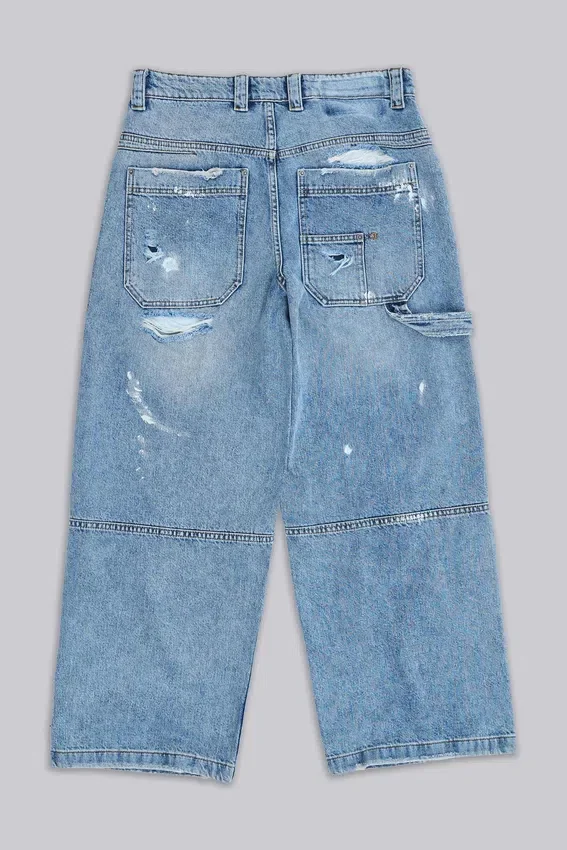 Blå vintage-slitna snickarjeans
