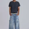 Blå vintage-slitna snickarjeans