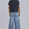 Blå vintage-slitna snickarjeans