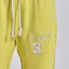 Cleo joggingsbyxor med slapp bootcut-passform i neon