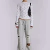 Cleo slitna, avslappnade joggingsbyxor med bootcut-passform