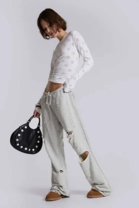 Cleo slitna, avslappnade joggingsbyxor med bootcut-passform