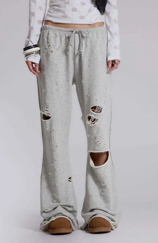 Cleo slitna, avslappnade joggingsbyxor med bootcut-passform