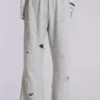 Cleo slitna, avslappnade joggingsbyxor med bootcut-passform