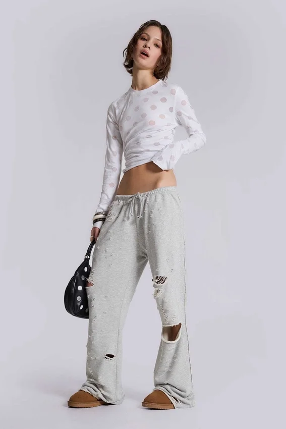 Cleo slitna, avslappnade joggingsbyxor med bootcut-passform