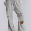 Cleo slitna, avslappnade joggingsbyxor med bootcut-passform