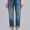 Cooper-jeans med dekorationer i kort modell