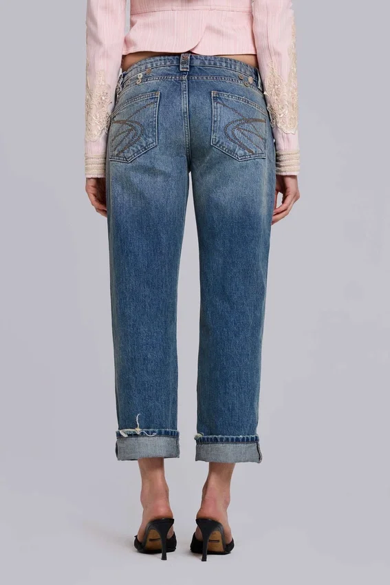 Cooper-jeans med dekorationer i kort modell