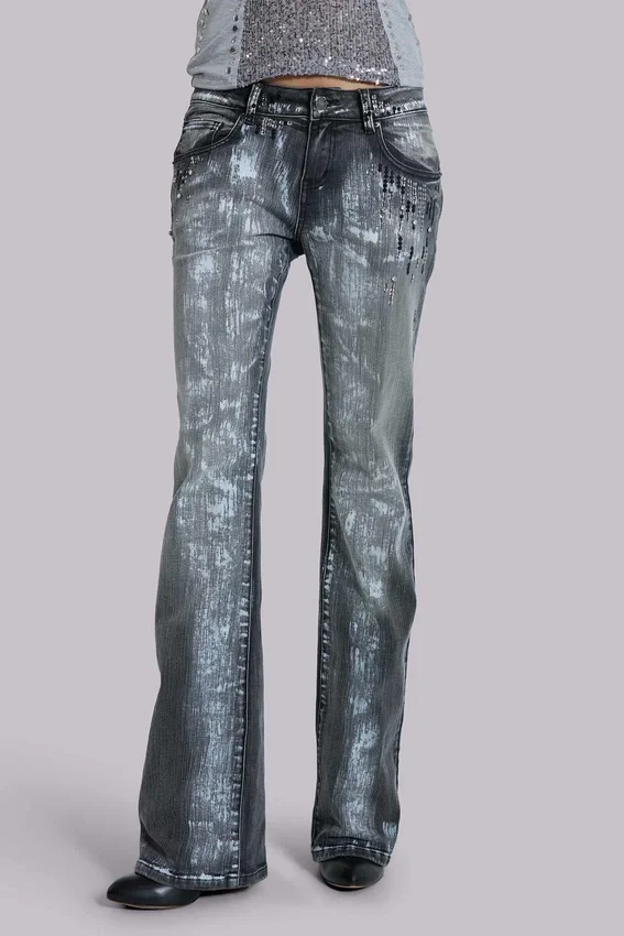 Cooper-jeans med paljetter och bootcut-passform
