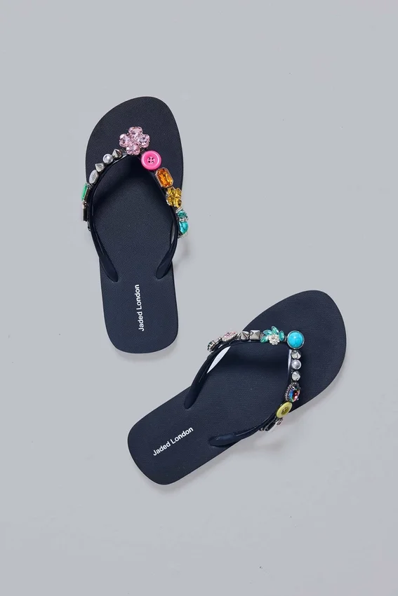 Flip-flops med smyckesberlocker