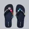 Flip-flops med smyckesberlocker