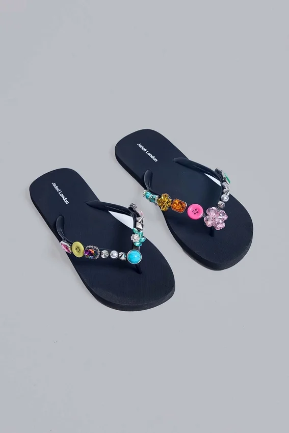 Flip-flops med smyckesberlocker
