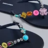 Flip-flops med smyckesberlocker