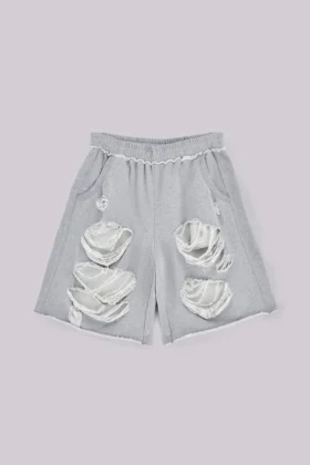 Gråa, slitna Monster-shorts