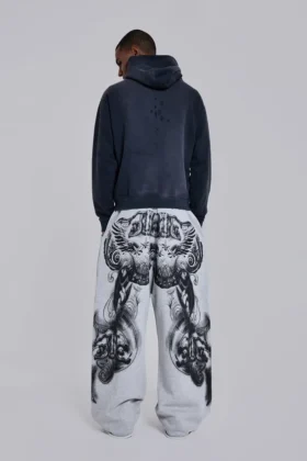Gråmelerade, baggy Monster Joggers med gotiskt tryck