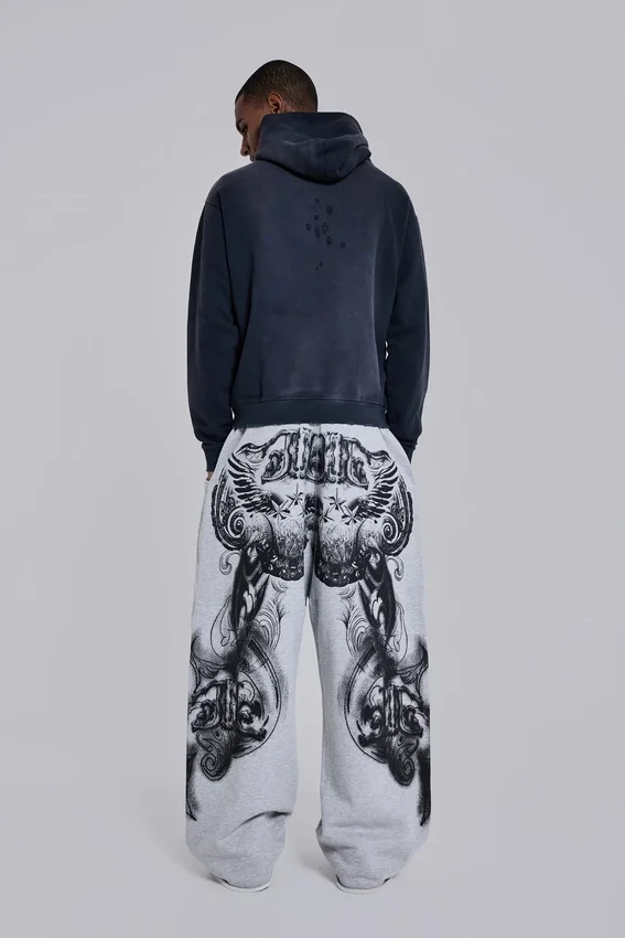 Gråmelerade, baggy Monster Joggers med gotiskt tryck