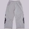 Gråmelerade, baggy Monster Joggers med gotiskt tryck