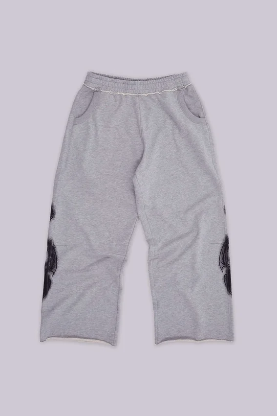 Gråmelerade, baggy Monster Joggers med gotiskt tryck