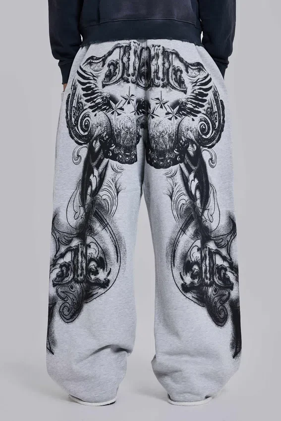 Gråmelerade, baggy Monster Joggers med gotiskt tryck