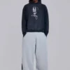 Gråmelerade, baggy Monster Joggers med gotiskt tryck