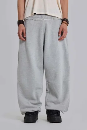 Gråmelerade, baggy Monster Joggers med uppvikt nederkant
