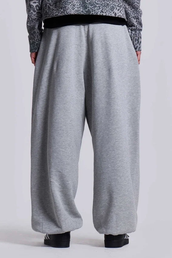 Gråmelerade, baggy Monster Joggers med uppvikt nederkant
