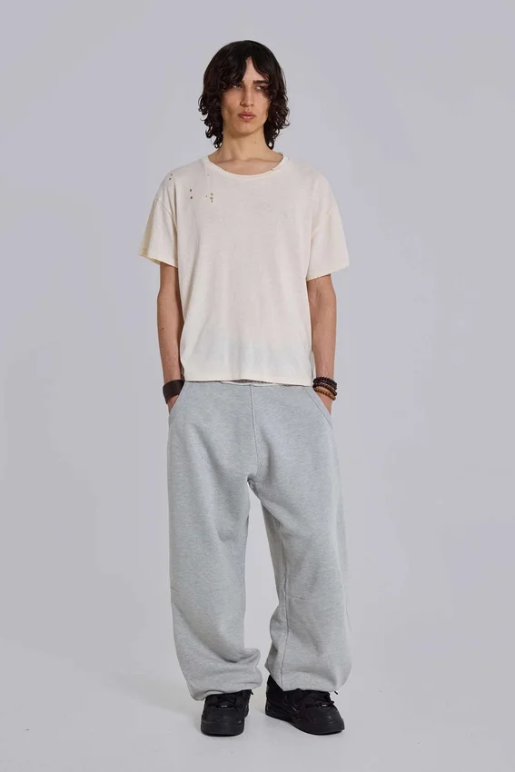 Gråmelerade, baggy Monster Joggers med uppvikt nederkant