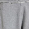 Gråmelerade, baggy Monster Joggers med uppvikt nederkant
