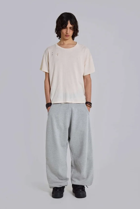 Gråmelerade, baggy Monster Joggers med uppvikt nederkant
