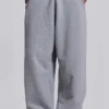 Gråmelerade, baggy Monster Joggers med uppvikt nederkant
