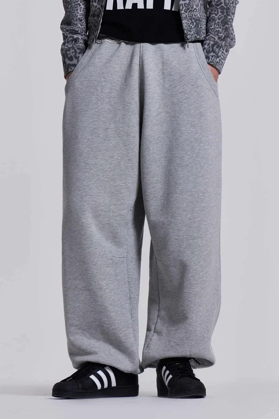 Gråmelerade, baggy Monster Joggers med uppvikt nederkant