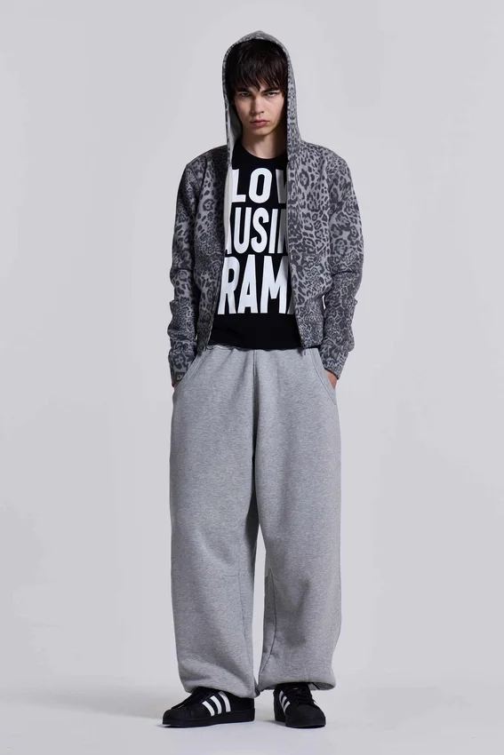 Gråmelerade, baggy Monster Joggers med uppvikt nederkant