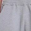 Gråmelerade joggingshorts i waffelväv med Monster-motiv