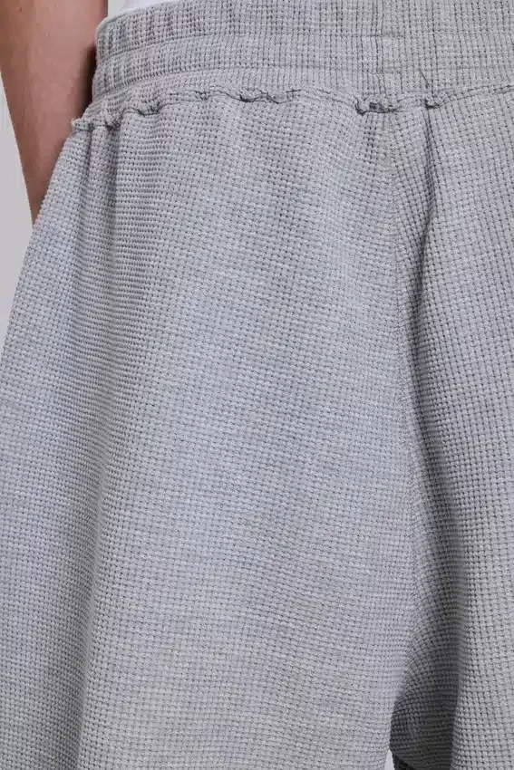 Gråmelerade joggingshorts i waffelväv med Monster-motiv