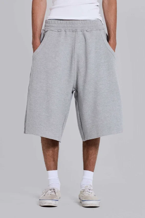 Gråmelerade joggingshorts i waffelväv med Monster-motiv