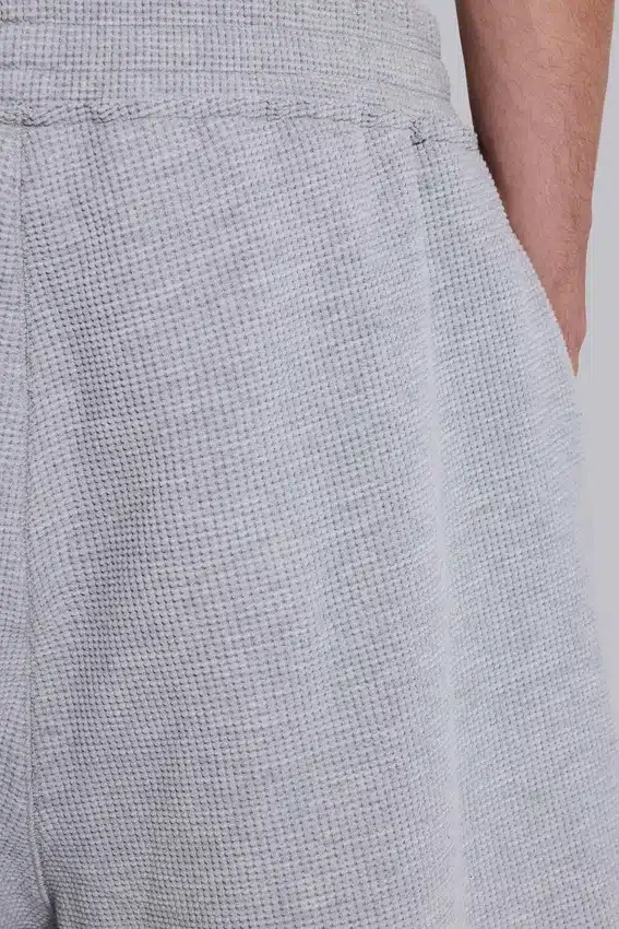 Gråmelerade joggingshorts i waffelväv med Monster-motiv