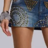 Hena-minikjol i denim med nitar