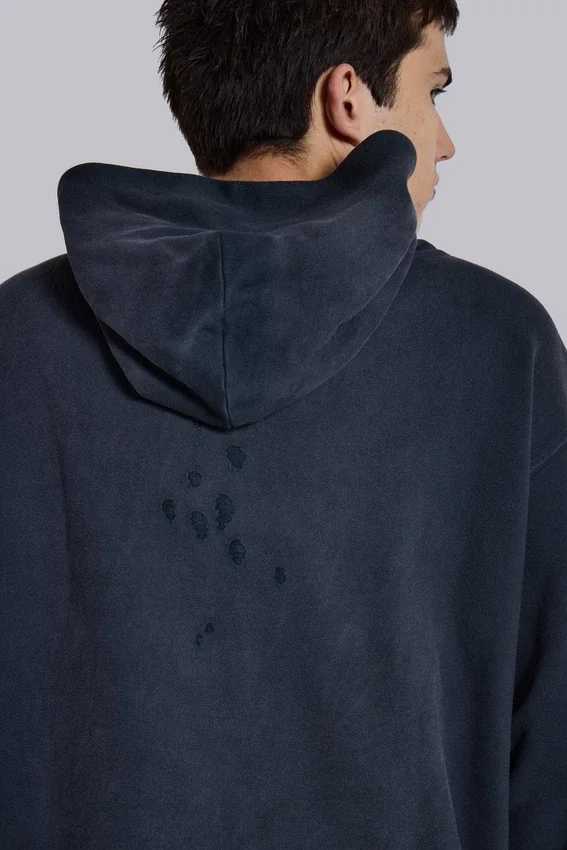 Huvtröja med emblem