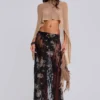Infinity Multiway-stickad cape i sand