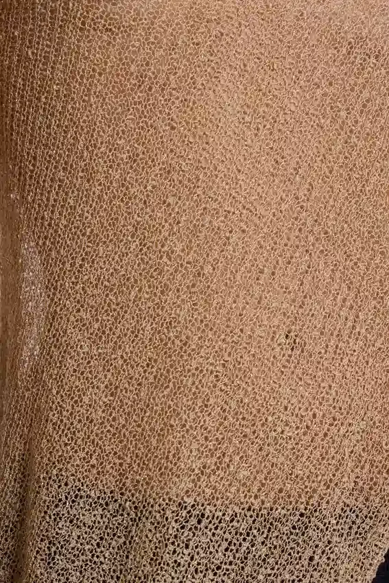 Infinity Multiway-stickad cape i sand