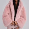 Mara oversized-kappa i rosa fuskpäls