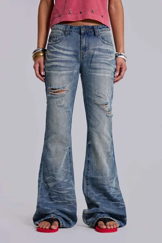 Mellblå slitna, skrynkliga Drift-Jeans med utsvängda ben