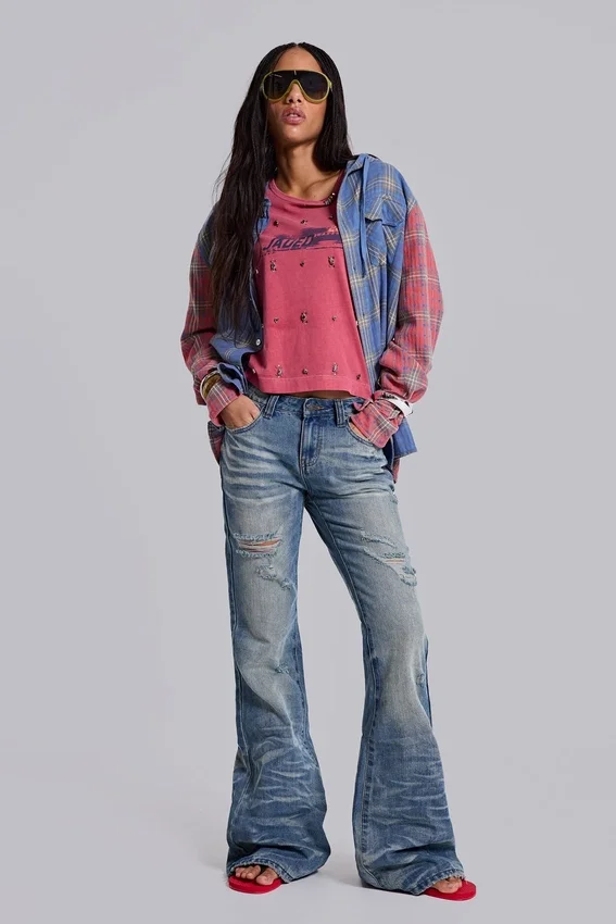 Mellblå slitna, skrynkliga Drift-Jeans med utsvängda ben