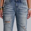 Mellblå slitna, skrynkliga Drift-Jeans med utsvängda ben