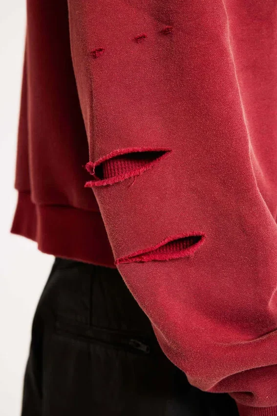Röd, solblekt hoodie med vaffelfoder och dragkedja
