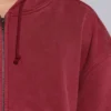 Röd, solblekt hoodie med vaffelfoder och dragkedja